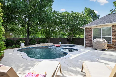 $699,000 | 10111 Earlington Manor Drive, Spring, TX 77379