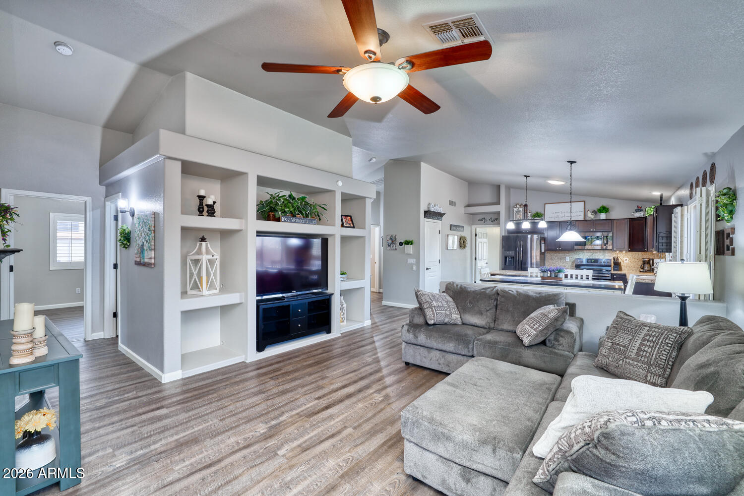 2206 East Ruby Lane Phoenix, AZ 85024 - Photo 13 of 29 a living room with furniture and kitchen view