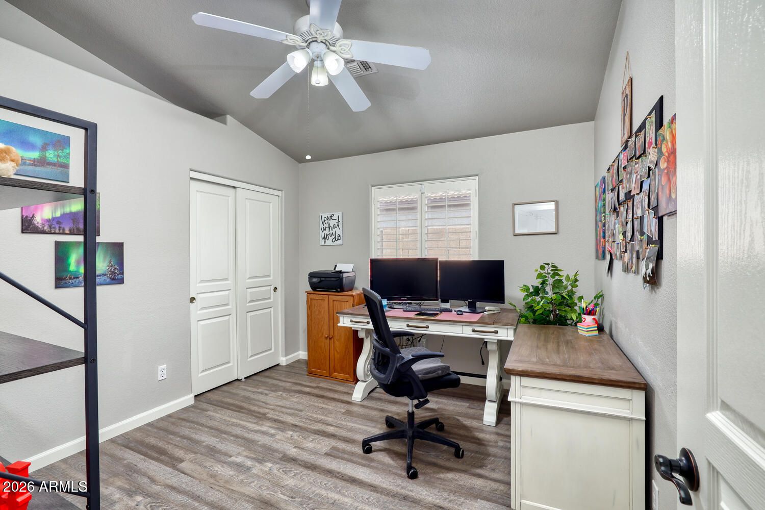 2206 East Ruby Lane Phoenix, AZ 85024 - Photo 18 of 29 a view of a workspace with furniture and a window