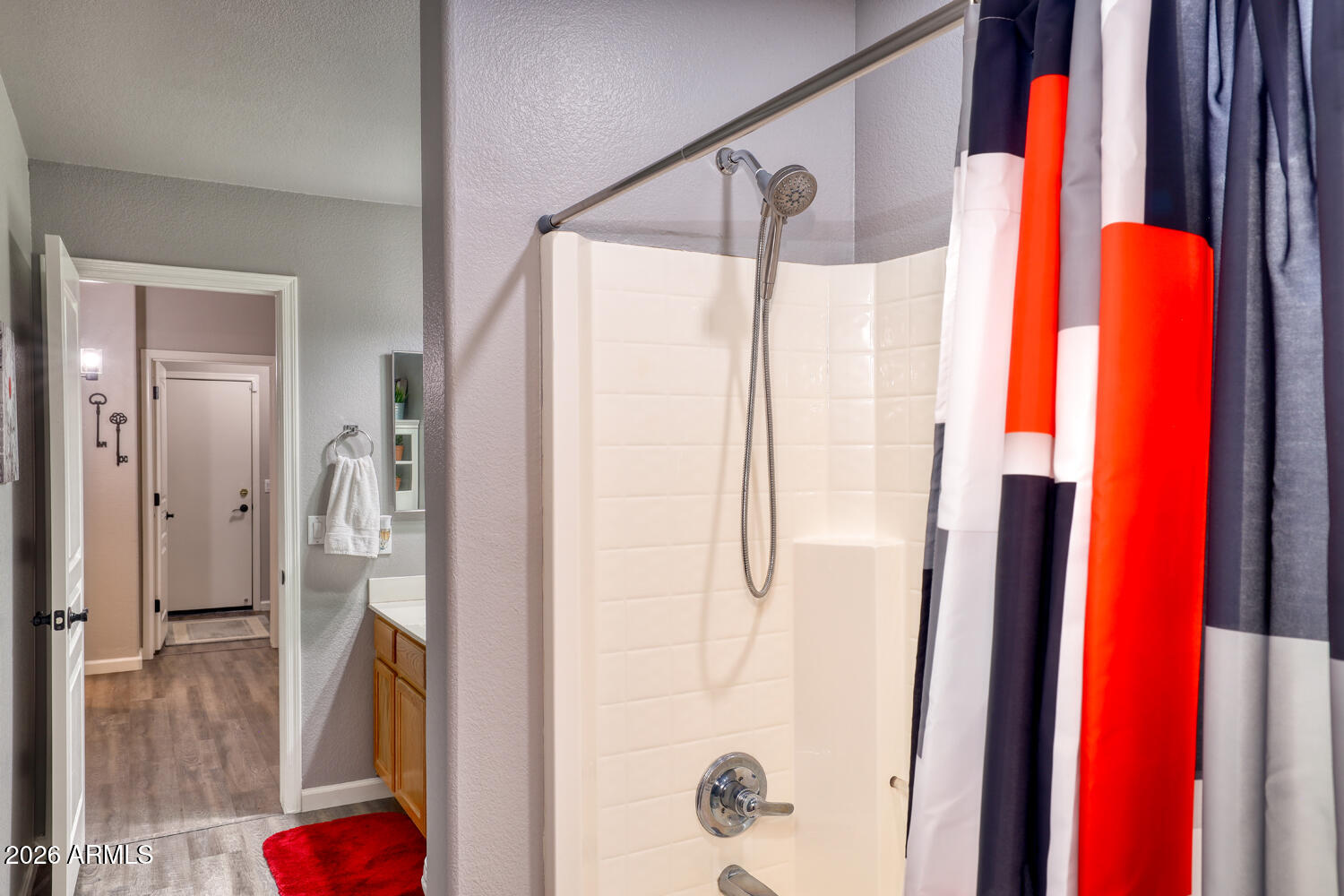 2206 East Ruby Lane Phoenix, AZ 85024 - Photo 24 of 29 a bathroom with a shower and a glass door