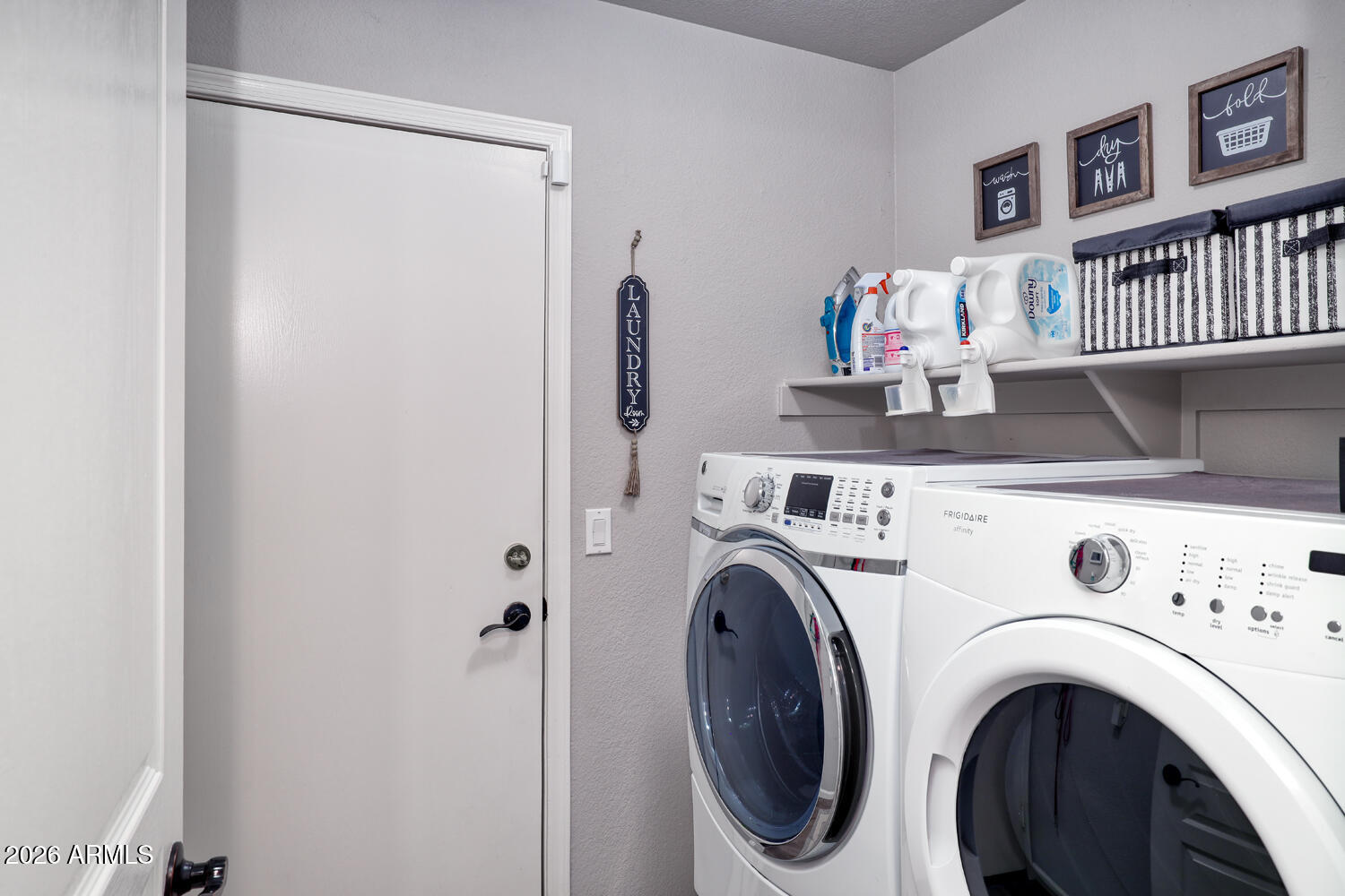 2206 East Ruby Lane Phoenix, AZ 85024 - Photo 25 of 29 a view of washer and dryer in a room