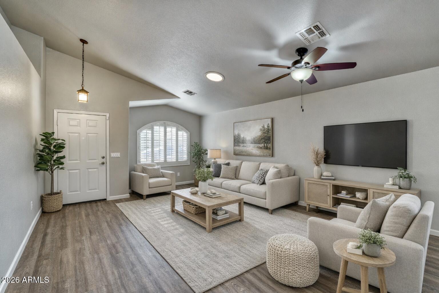 2206 East Ruby Lane Phoenix, AZ 85024 - Photo 6 of 29 a living room with furniture and a flat screen tv