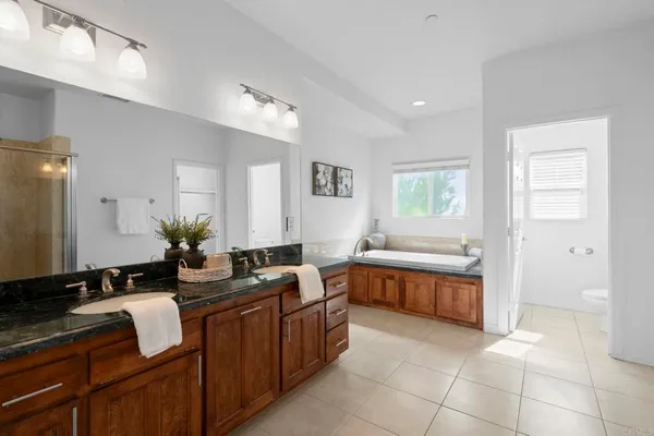 a bath tub sitting next to a window
