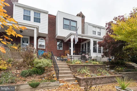 a front view of a building with street view