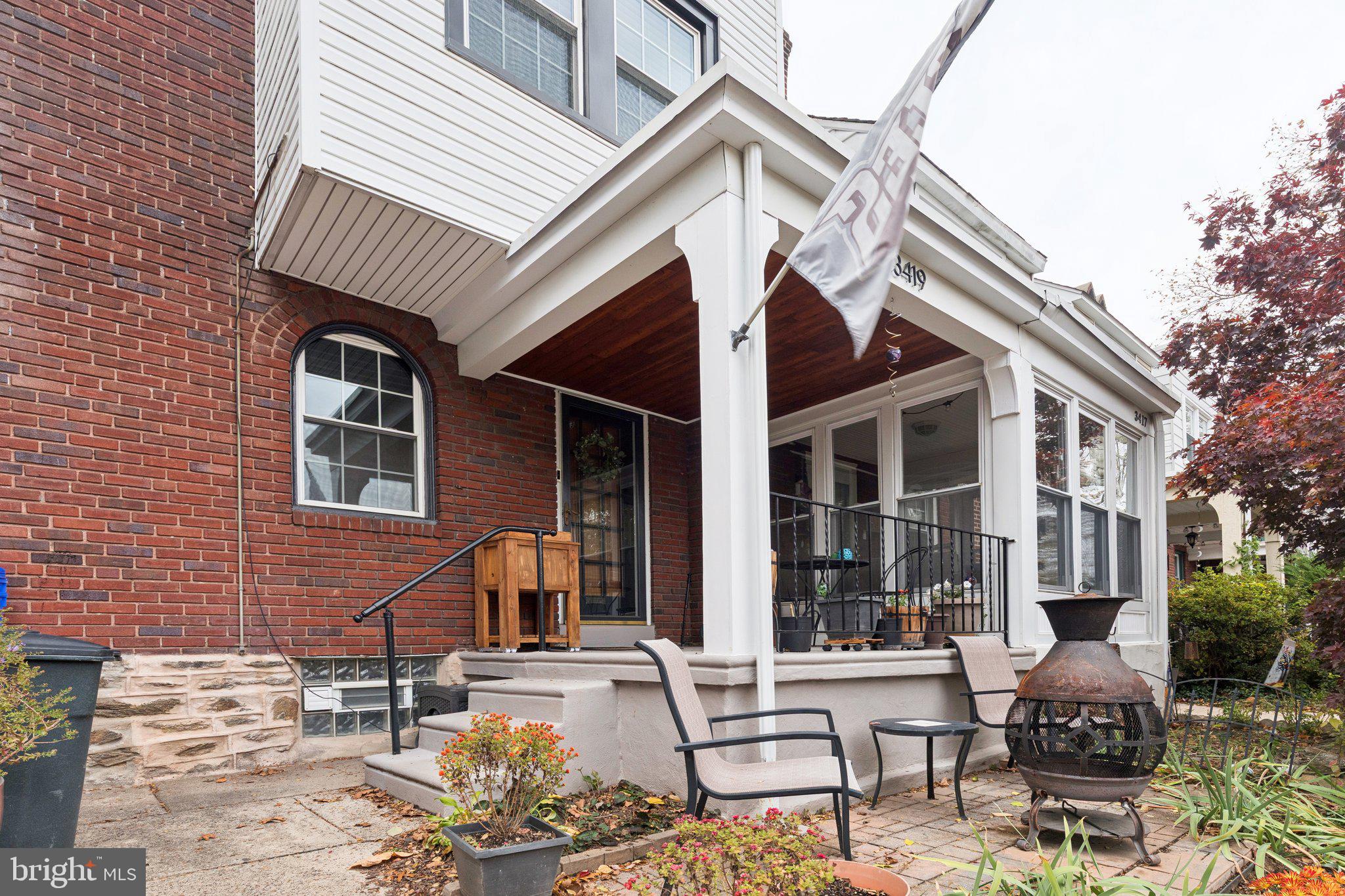 3419 Tilden Street Philadelphia, PA 19129 - Photo 15 of 16 a view of a patio with a table and chairs and potted plants