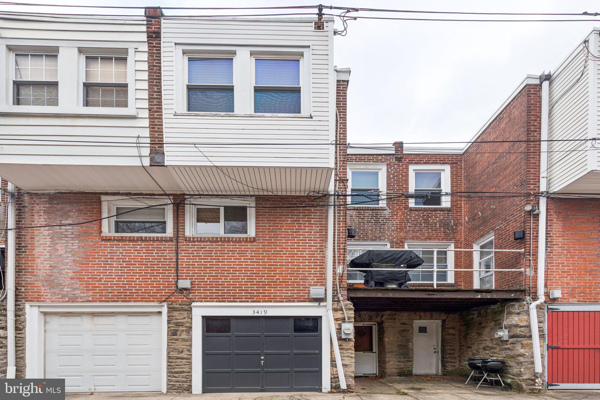 3419 Tilden Street Philadelphia, PA 19129 - Photo 16 of 16 a front view of a building with glass windows
