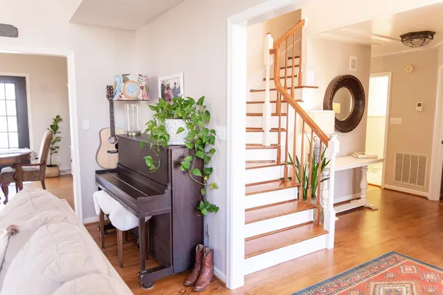 a view of a living room and entryway