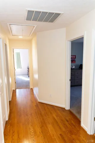 a bedroom with a bed and a table