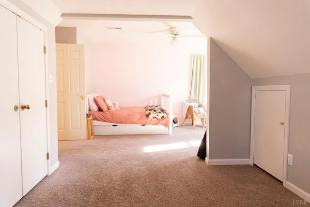 a view of a room with a wardrobe