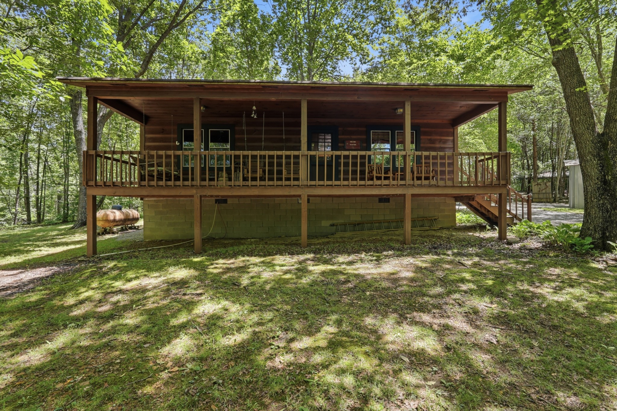 118 Cherokee Road Spencer, TN 38585 - Photo 28 of 85 front view of house with a small yard and a large tree