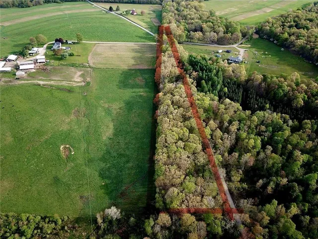 a view of a lake with a house