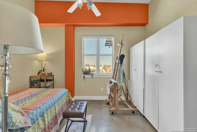 a bedroom with furniture and a bed