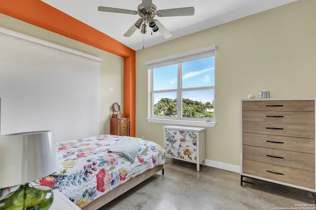 a bed room with furniture and decor