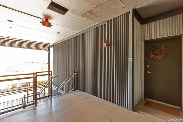 a view of a swimming pool with a outdoor seating