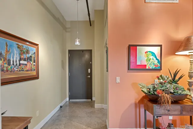 a room with gym equipment and a table