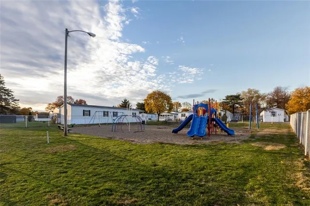 a view of a park with swings