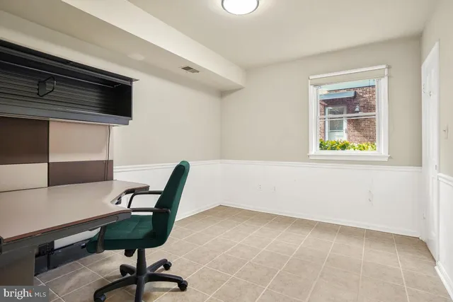 a utility room with sink dryer and washer