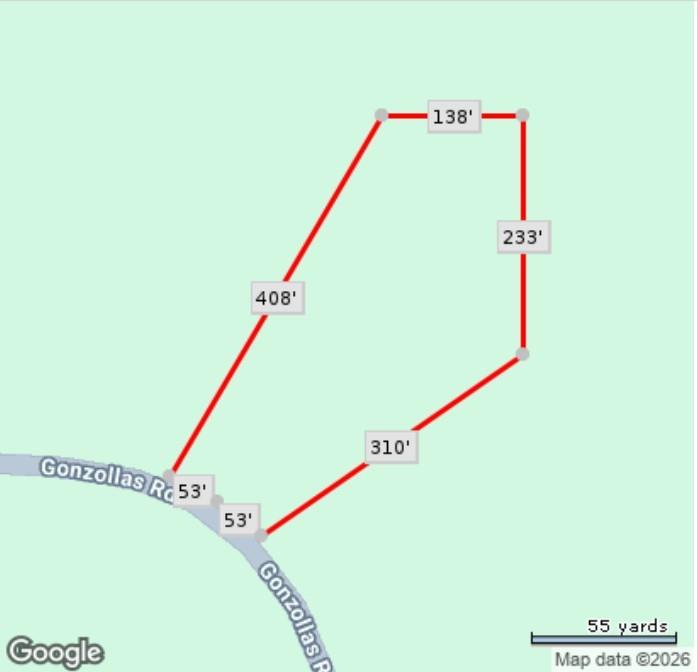 a utility room with dryer and stairs