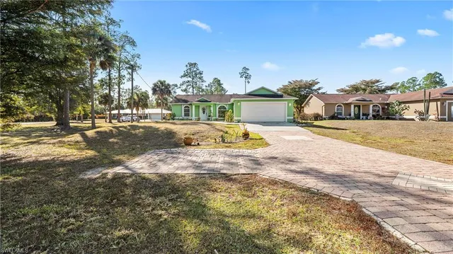 a view of backyard of a house
