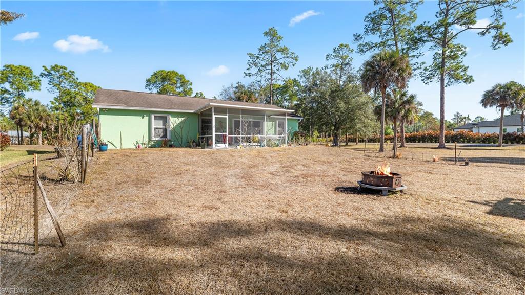 3340 2nd Avenue Southeast Naples, FL 34117 - Photo 24 of 25 a view of back yard of the house