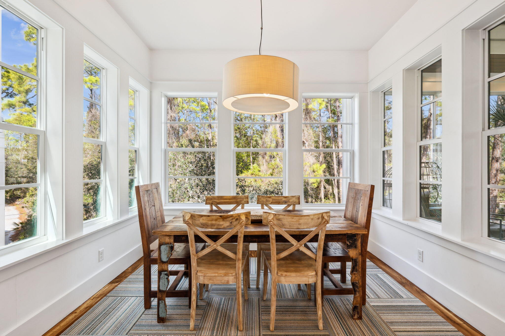 200 East Blue Crab Loop Inlet Beach, FL 32461 - Photo 16 of 69 a view of a dining room with furniture window and outside view
