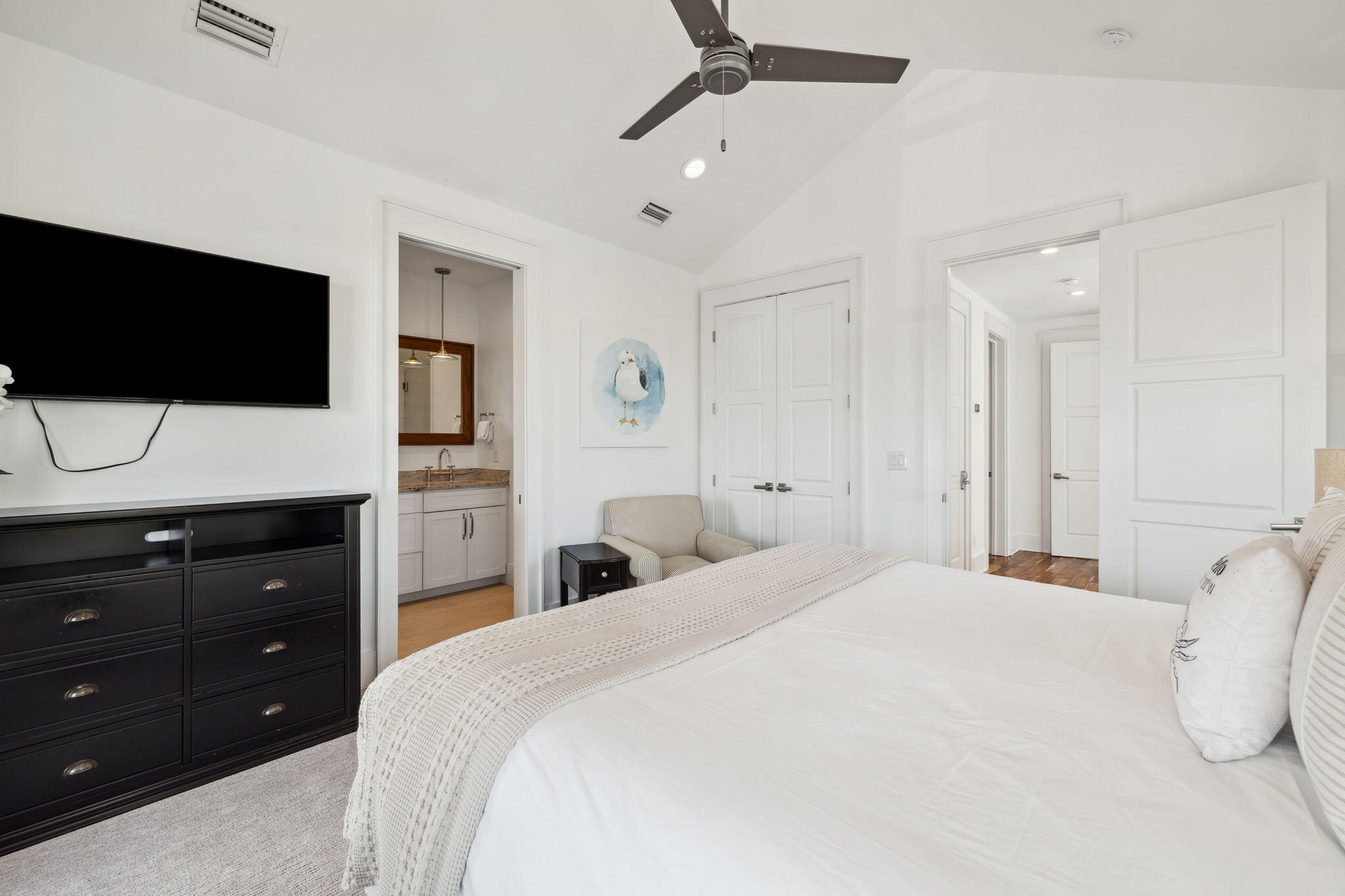 200 East Blue Crab Loop Inlet Beach, FL 32461 - Photo 46 of 69 a bedroom with a bed and a flat screen tv