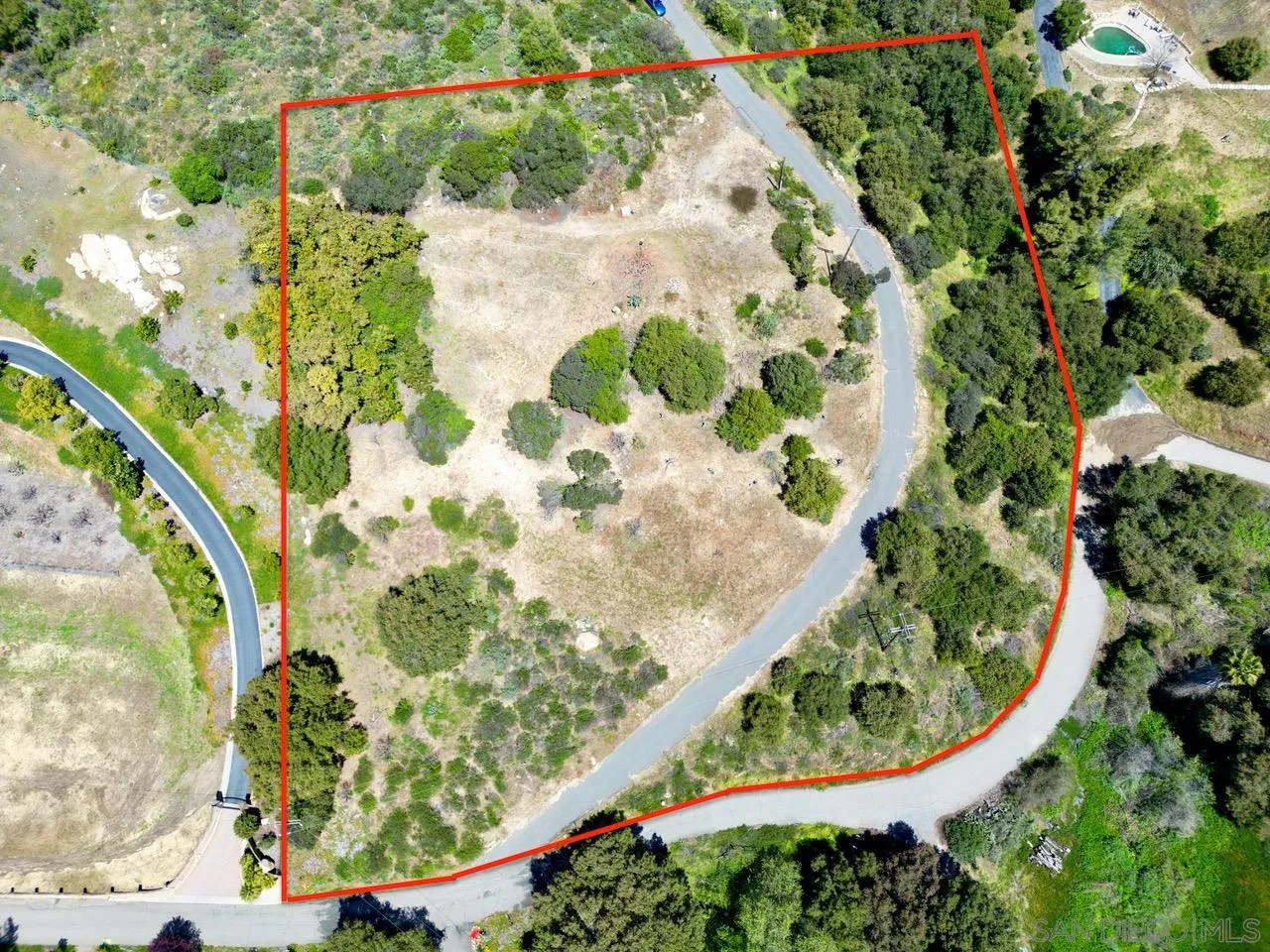 10448 Couser Way Valley Center, CA 92082 - Photo 2 of 17 a view of a garden with flowers