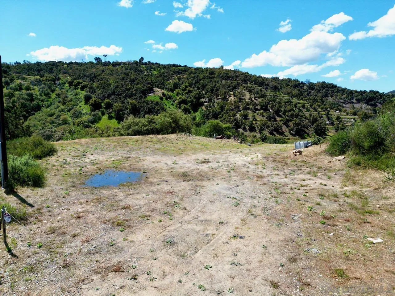 10448 Couser Way Valley Center, CA 92082 - Photo 6 of 17 a view of a yard with a tree