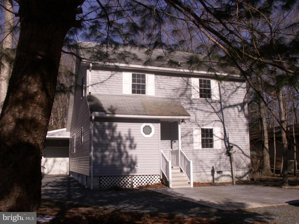 163 Windjammer Road Ocean Pines, MD 21811 - Photo 1 of 8 a view of a large white house