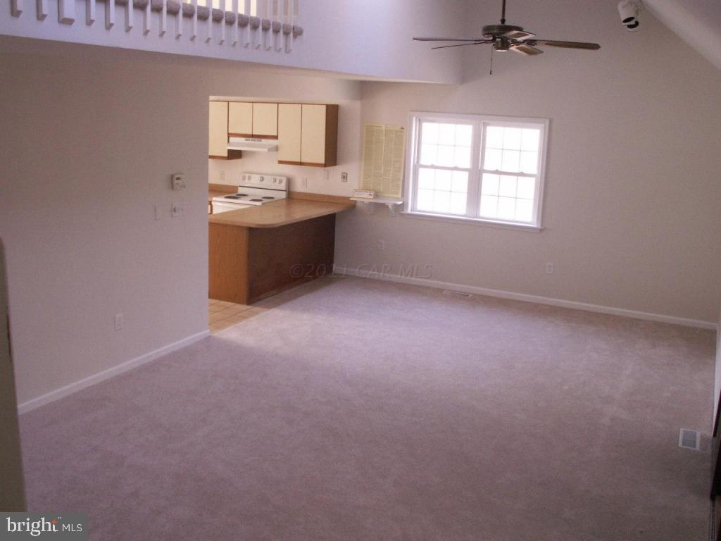 163 Windjammer Road Ocean Pines, MD 21811 - Photo 2 of 8 an empty room with windows and sink