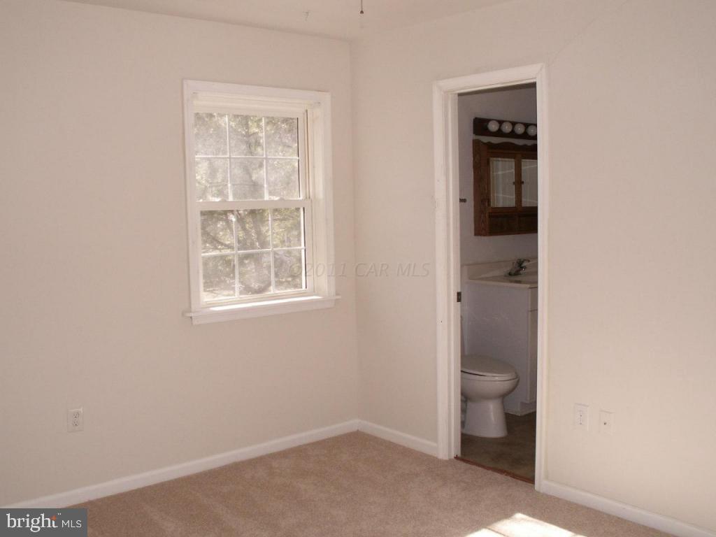 163 Windjammer Road Ocean Pines, MD 21811 - Photo 6 of 8 a bathroom with a toilet
