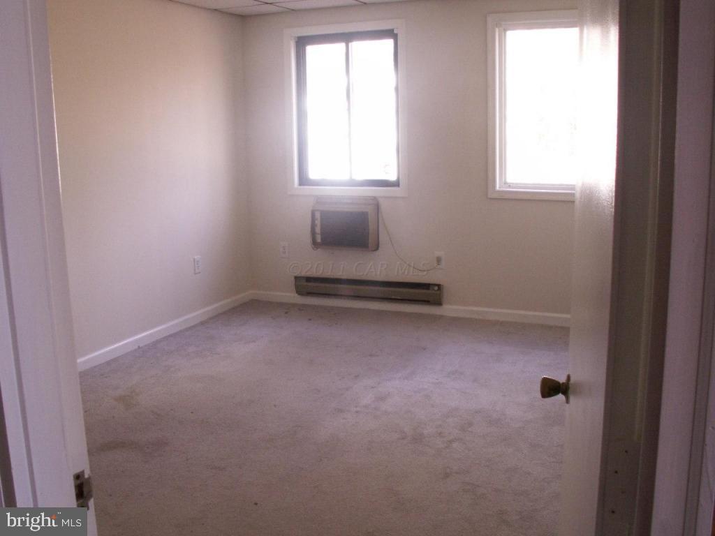 163 Windjammer Road Ocean Pines, MD 21811 - Photo 7 of 8 an empty room with a window