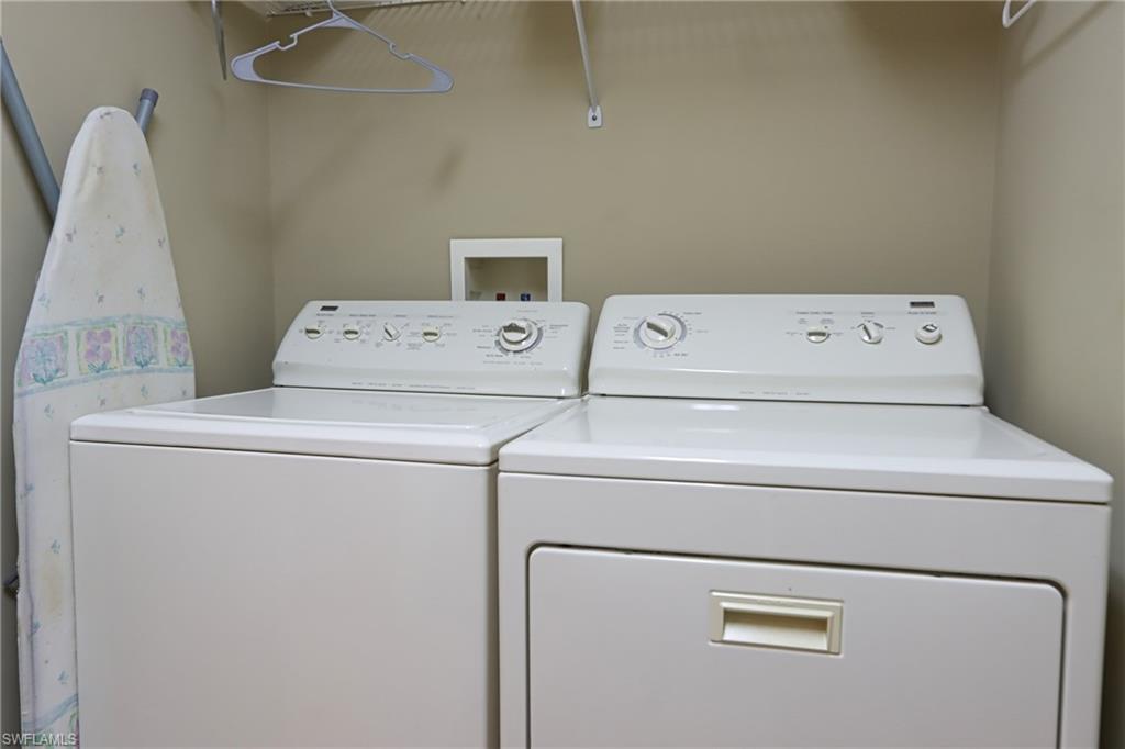 5815 Persimmon Way Naples, FL 34110 - Photo 19 of 24 a utility room with dryer and washer