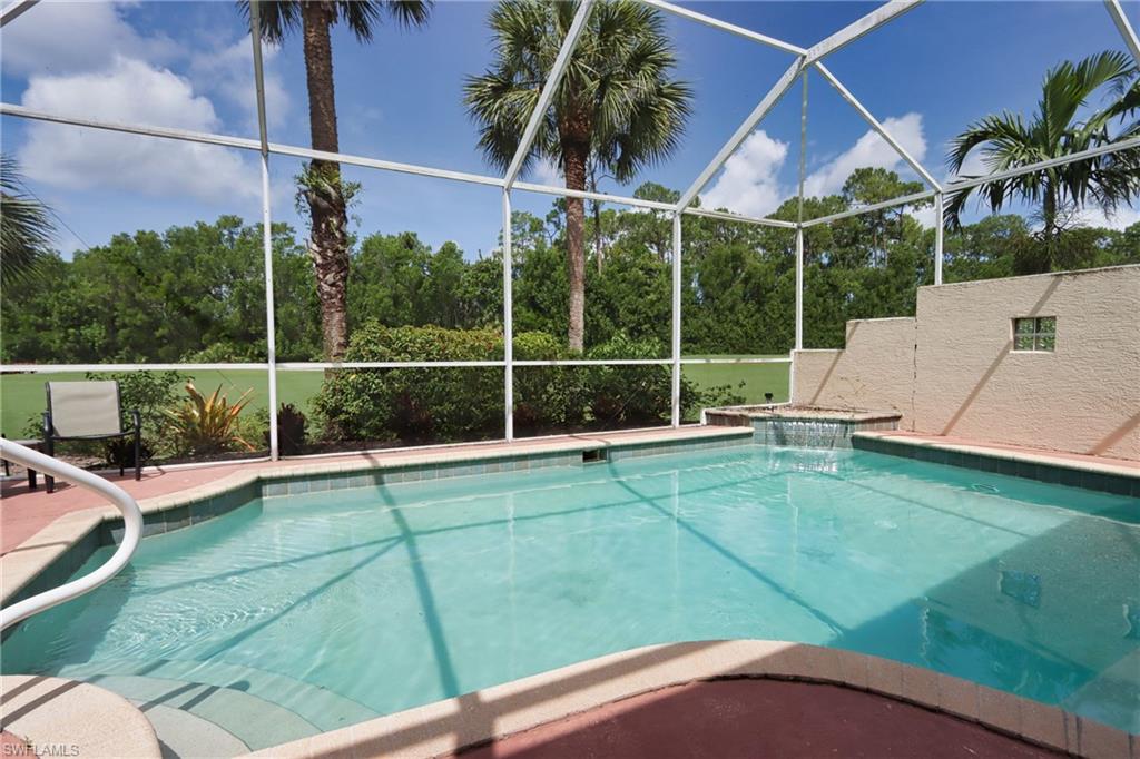 5815 Persimmon Way Naples, FL 34110 - Photo 22 of 24 a view of a backyard