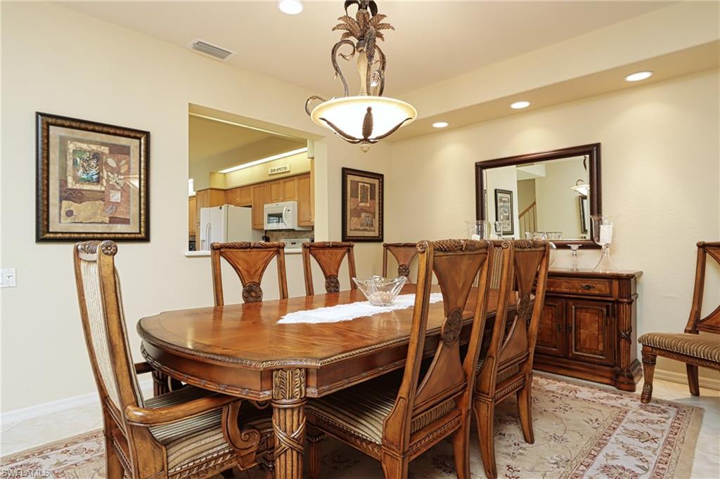 5815 Persimmon Way Naples, FL 34110 - Photo 4 of 24 a view of a dining room with furniture