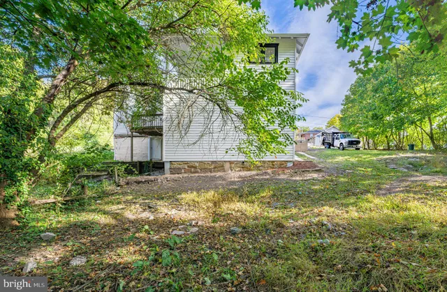 a view of a livingroom from a hallway
