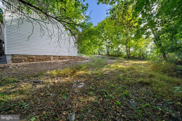 a living room with furniture fireplace and a flat screen tv