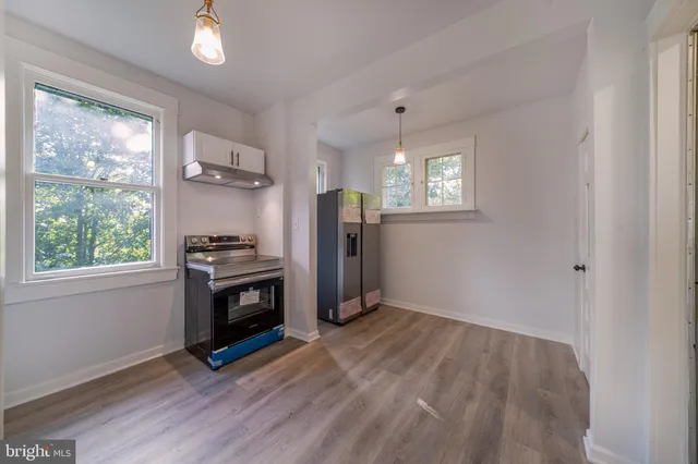an empty room with wooden door