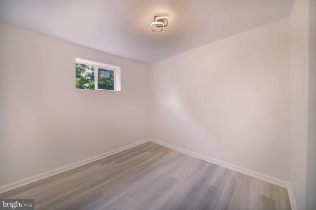 an aerial view of a house with outdoor space