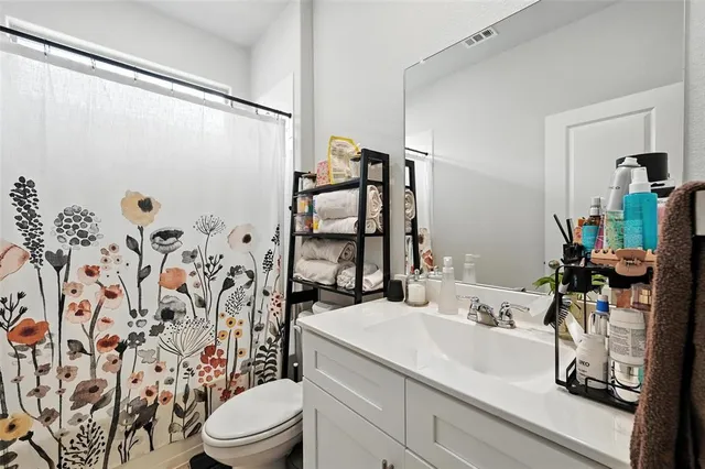 a bedroom with a bed and a closet