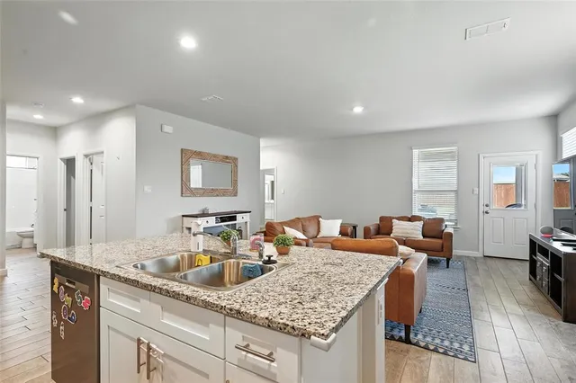 a view of a yard in front of a house with garage