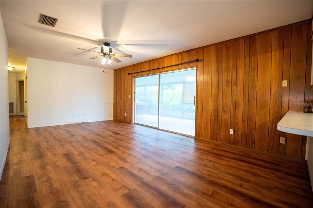 417 L Lanier Road Fort Meade, FL 33841 - Photo 20 of 36 wooden floor in an empty room with a window