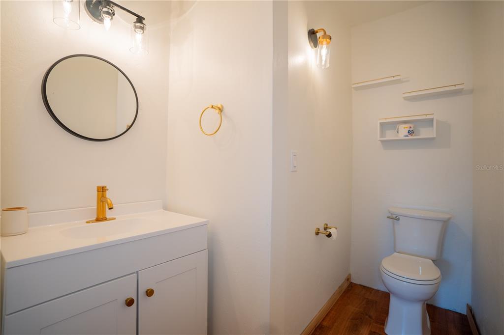 417 L Lanier Road Fort Meade, FL 33841 - Photo 29 of 36 a bathroom with a sink and a mirror