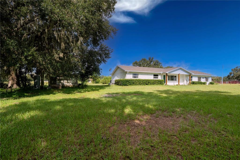 417 L Lanier Road Fort Meade, FL 33841 - Photo 3 of 36 a house view with garden space