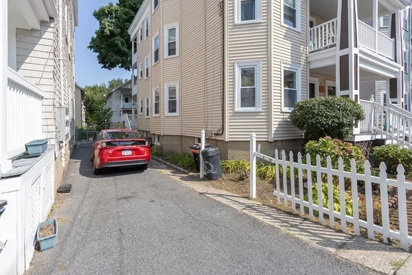 a view of a house with a street