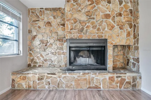 a living room with a fireplace