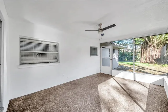 a view of a livingroom with a large window