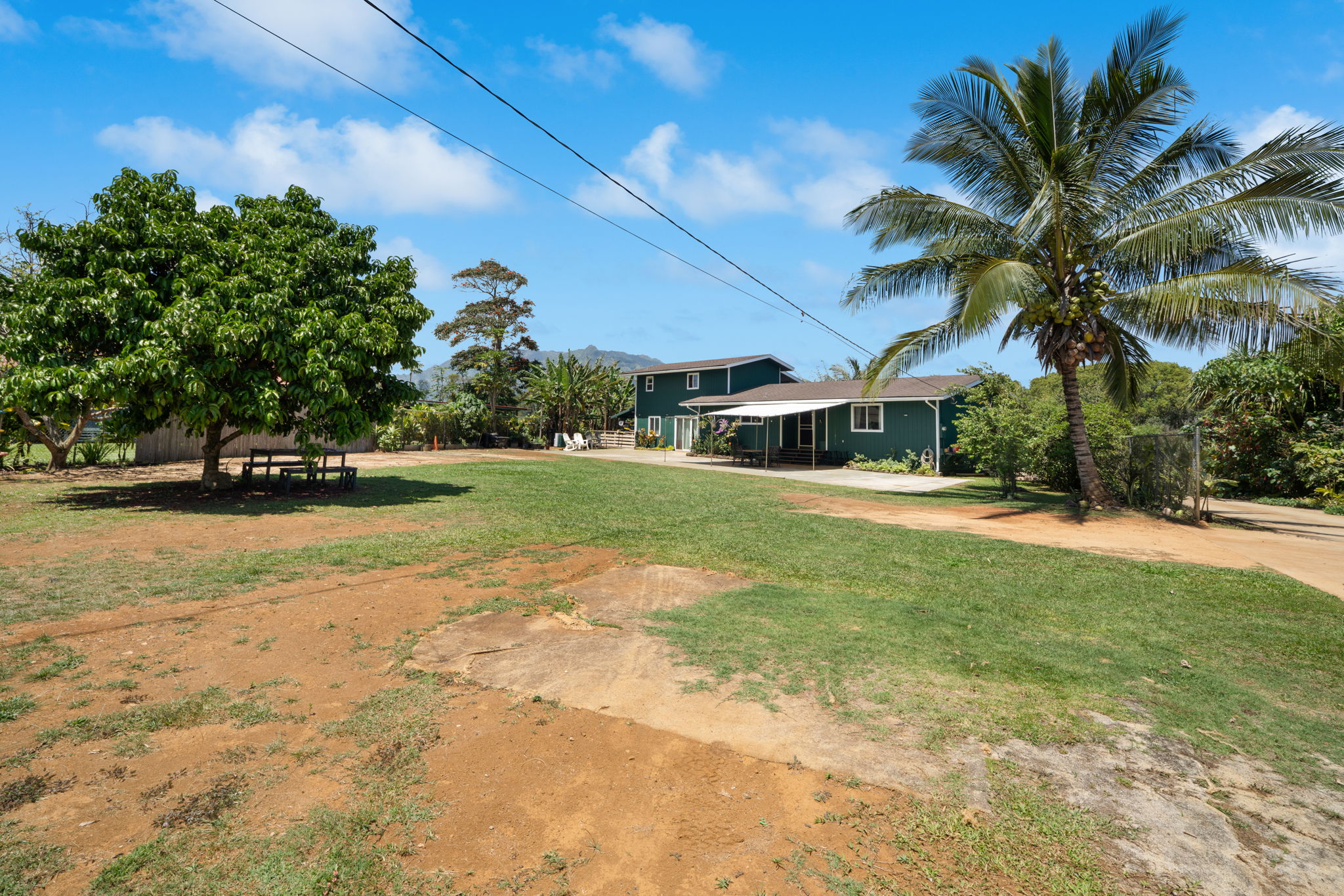 6100 Kawaihau Road Kapaa, HI 96746 - Photo 2 of 22 a view of outdoor space with garden and trees