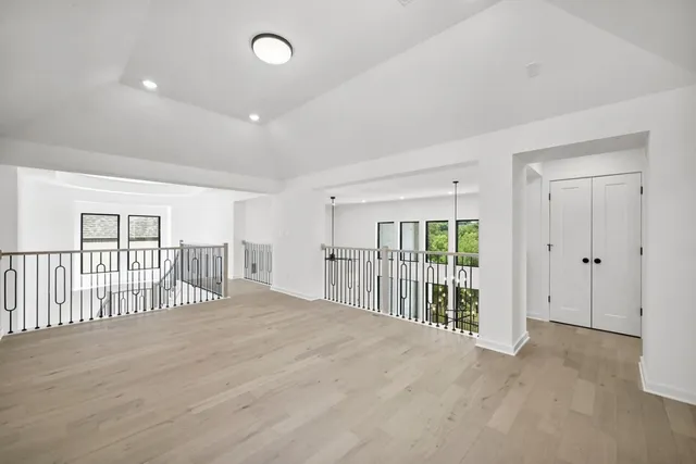 a view of a porch with wooden floor