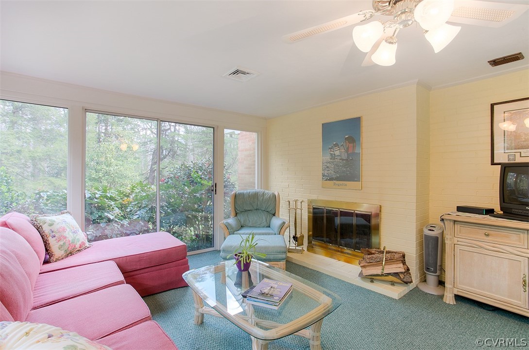 4036 Sherbrook Road Richmond, VA 23235 - Photo 18 of 41 A wood burning fireplace adds abundant charm to th